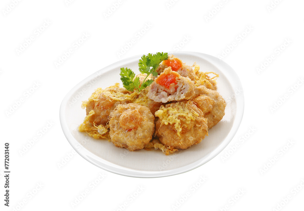 thai pork and egg fried on white ceramic dish thai pork and egg fried on white ceramic dish