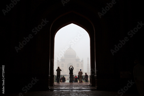 Tourists taking pictures of Taj Mahal Mausoleum, Agra, India