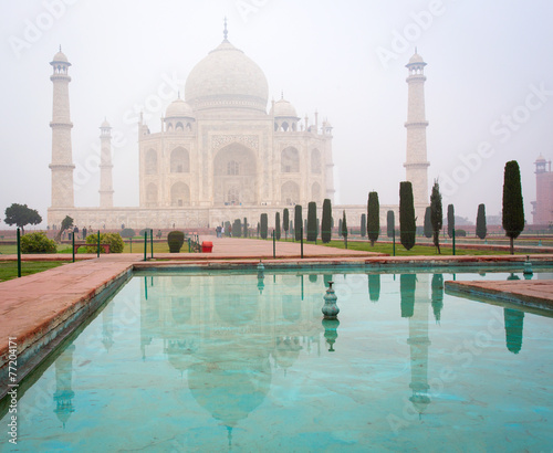 Taj-Mahal mausoleum with reflection in water. Agra, India