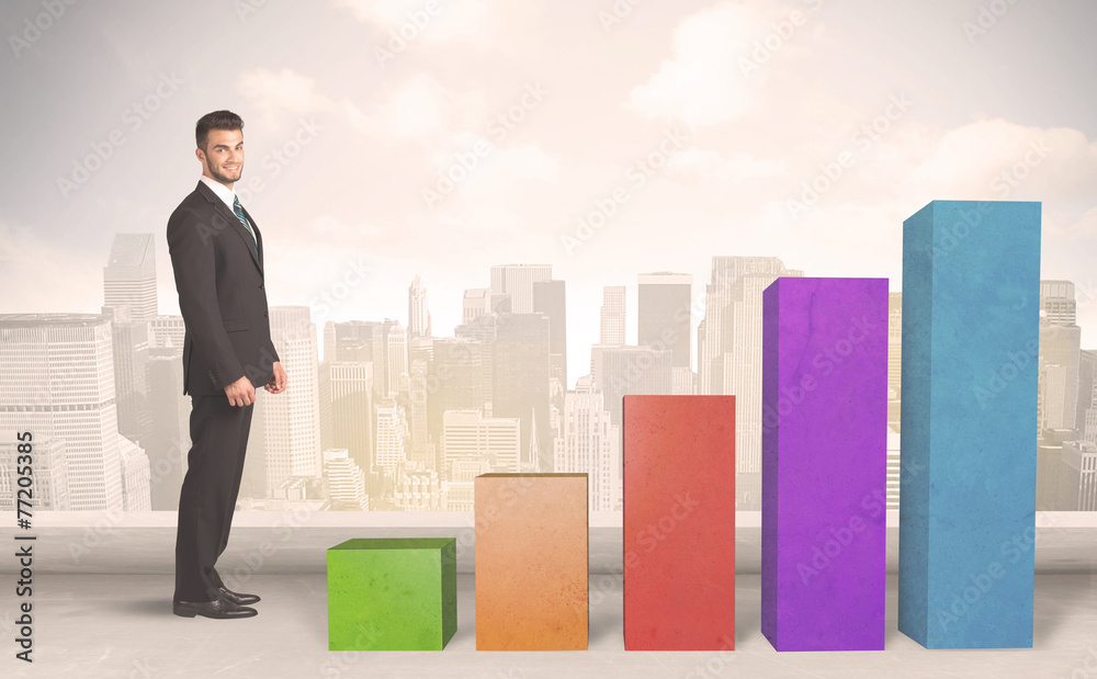 Business person climbing up on colourful chart pillars concept Business person climbing up on colourful chart pillars concept