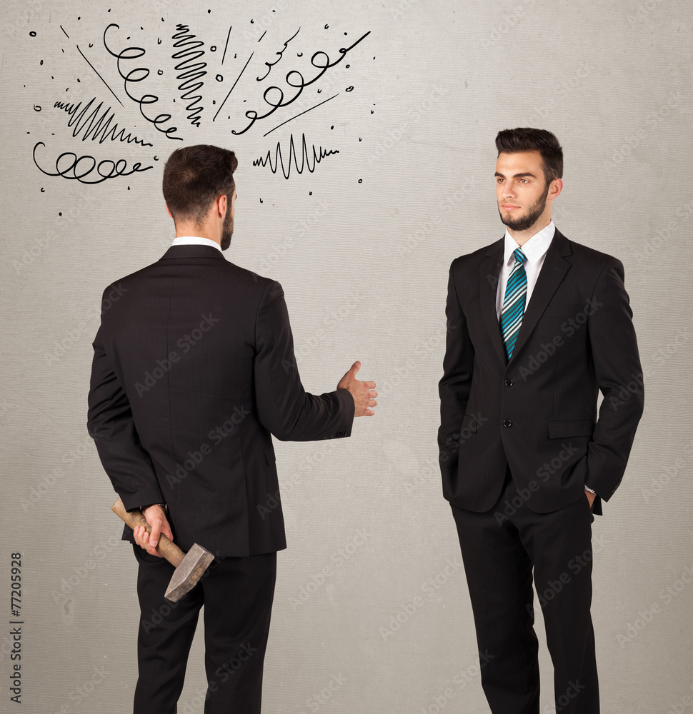 Angry business handshake concept Angry business handshake concept