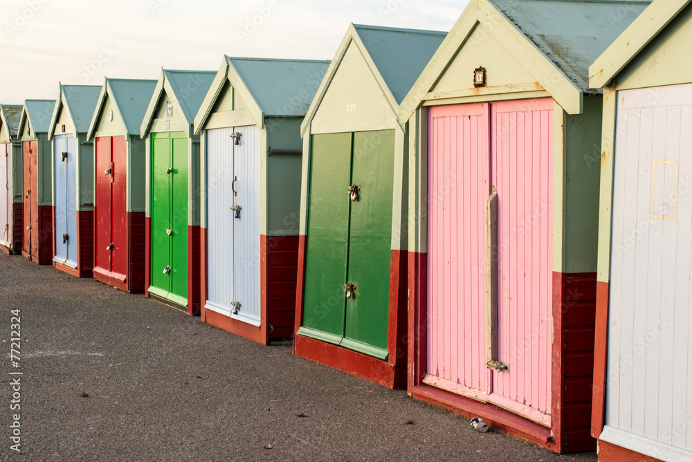 Naklejka premium Beach huts in autumnal light