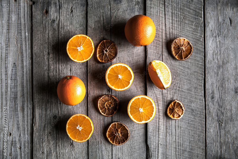 Beautiful background of fresh sliced oranges and dried slices Beautiful background of fresh sliced oranges and dried slices