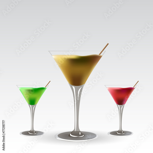 Goblets with a cocktail three different on a gray background