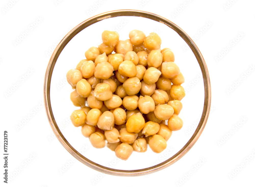 Chickpeas on bowl on white background seen from above Chickpeas on bowl on white background seen from above