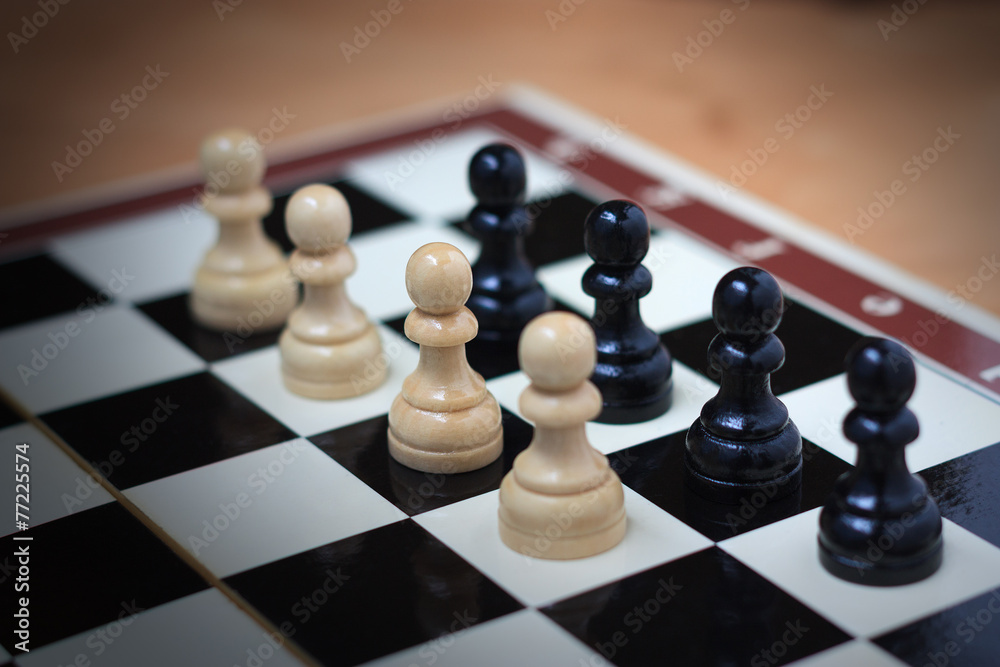 Confrontation of pawns on a chess board Confrontation of pawns on a chess board