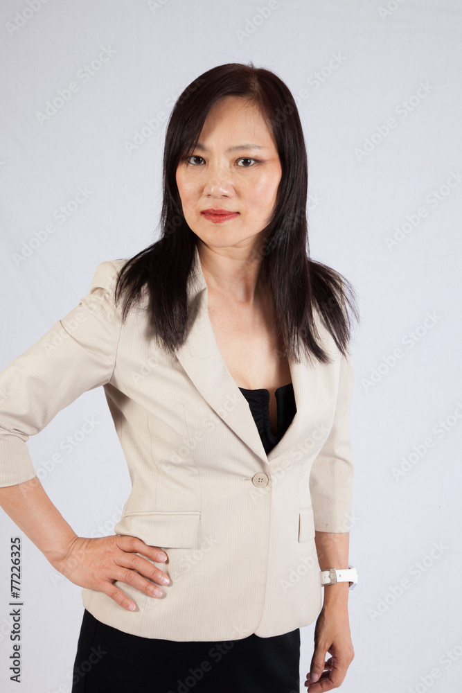 Asian woman with a thoughtful expression Asian woman with a thoughtful expression