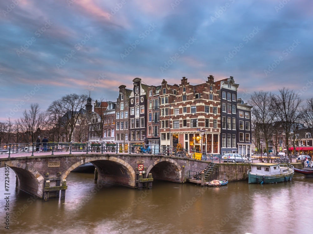Obraz premium Canal houses sunset Amsterdam