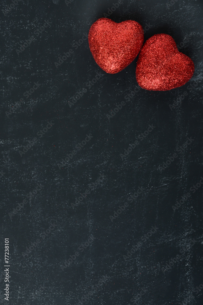 Obraz premium Red Hearts on a Chalkboard for Valentines Day