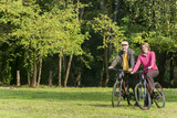 Senior couple riding bicycles