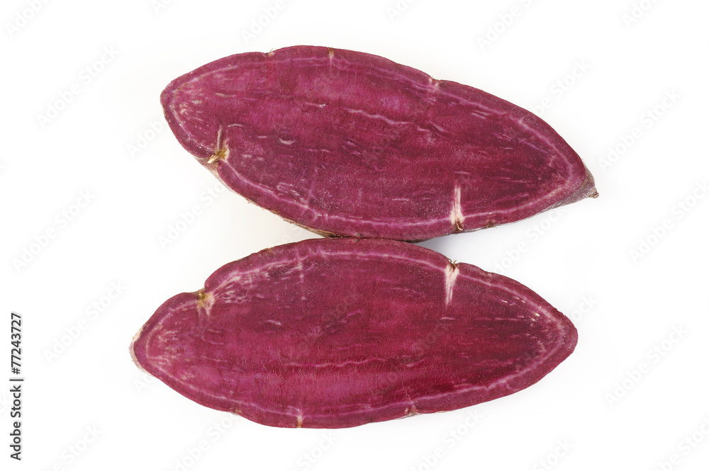 Obraz premium Purple sweet potatoes on white background