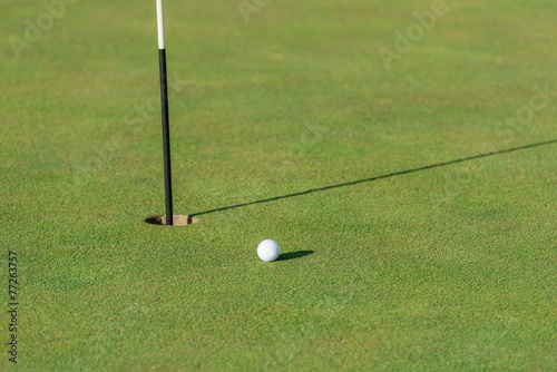 Golf ball and pin