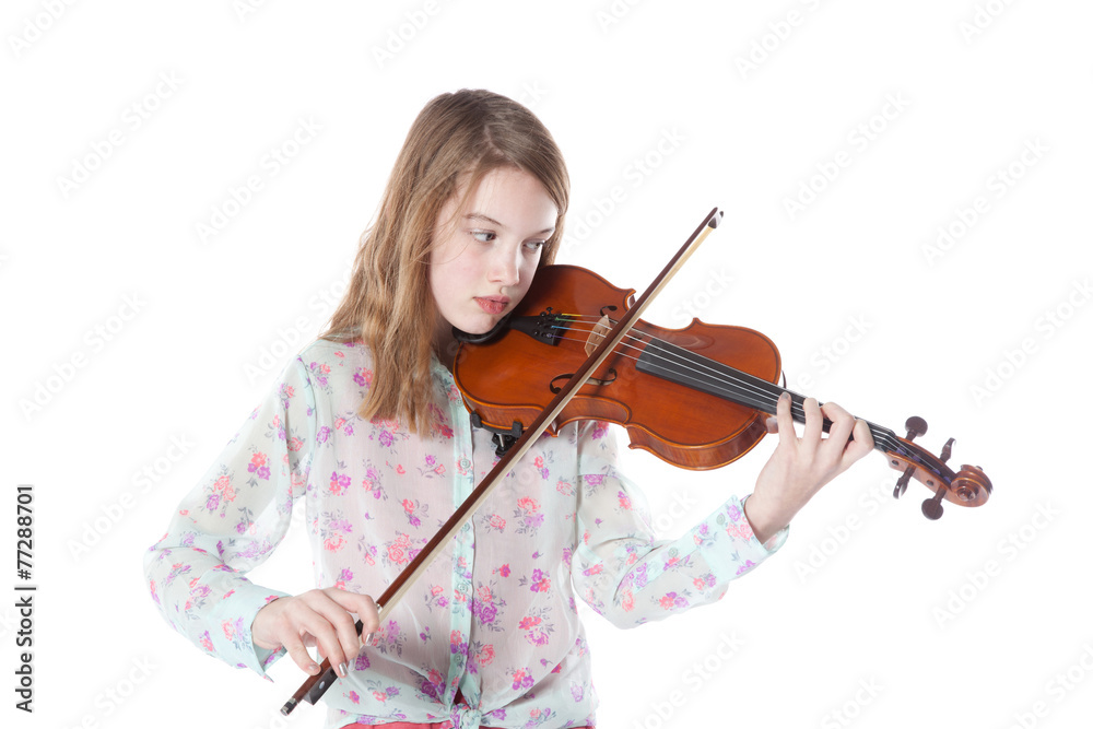 young girl in studio plays the violin