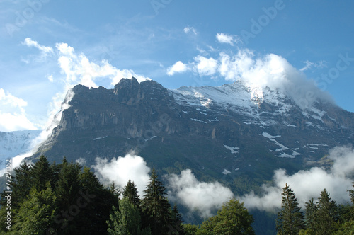 Ridge and Eiger peak in clouds nearby Grindelwald in Switzerland