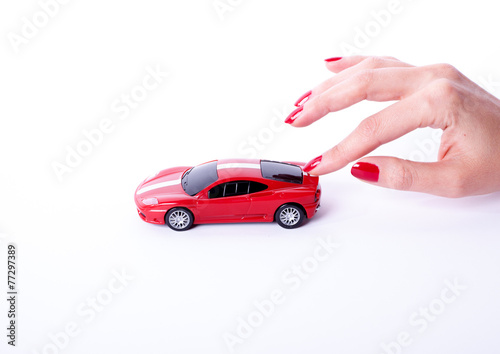Hand with a car