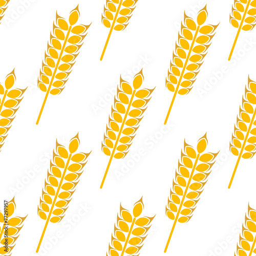 Ripe golden wheat in a seamless pattern