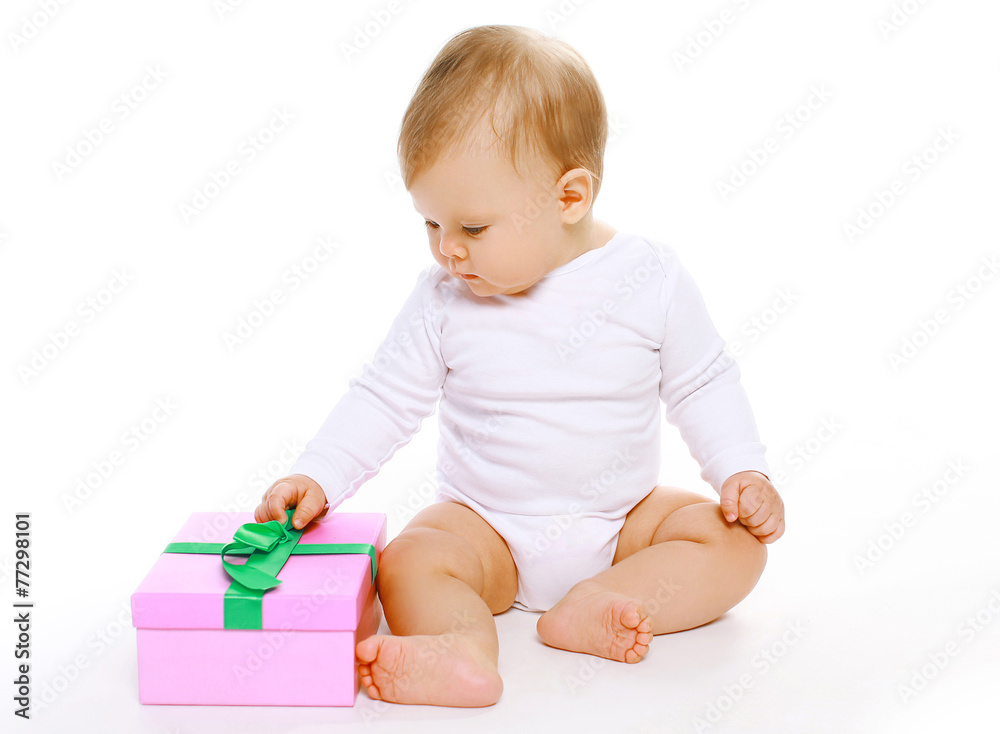 Cute baby sitting with gift box Cute baby sitting with gift box