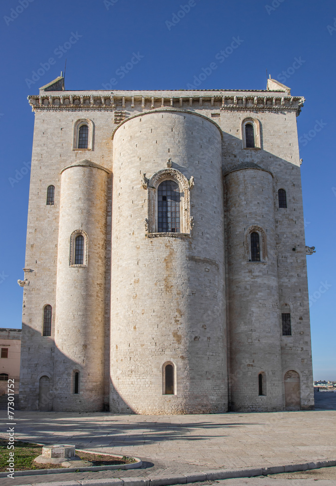 Back of the Trani cathedral against a blue sky