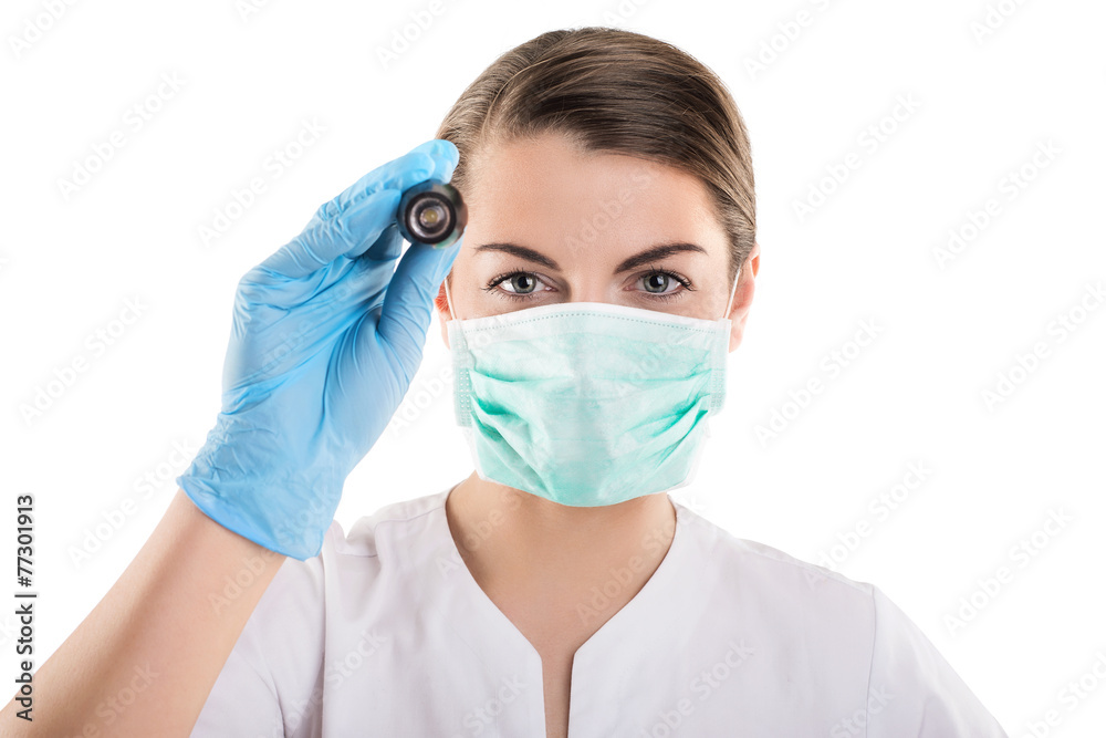 Portrait of doctor woman with mask using flashlight, isolated Portrait of doctor woman with mask using flashlight, isolated