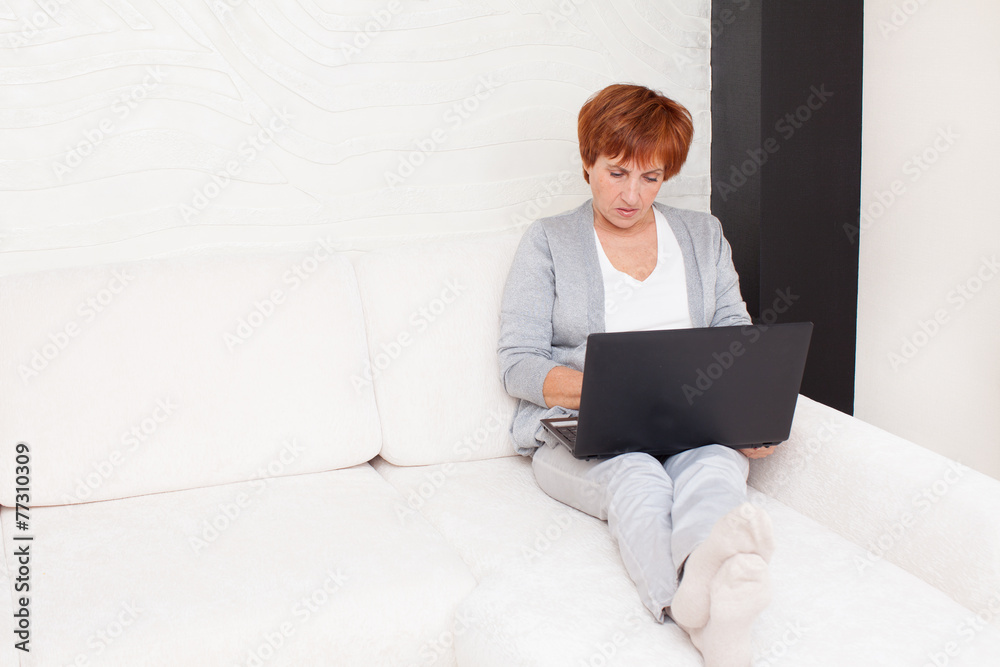 Mature woman with laptop Mature woman with laptop