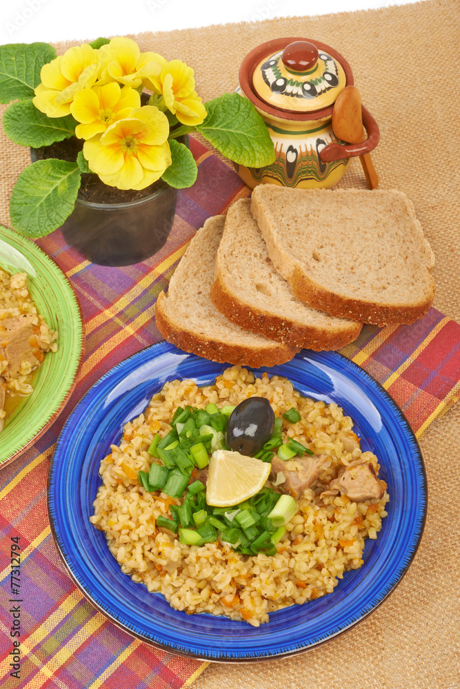 Porridge in a dish seasoned with chives Porridge in a dish seasoned with chives