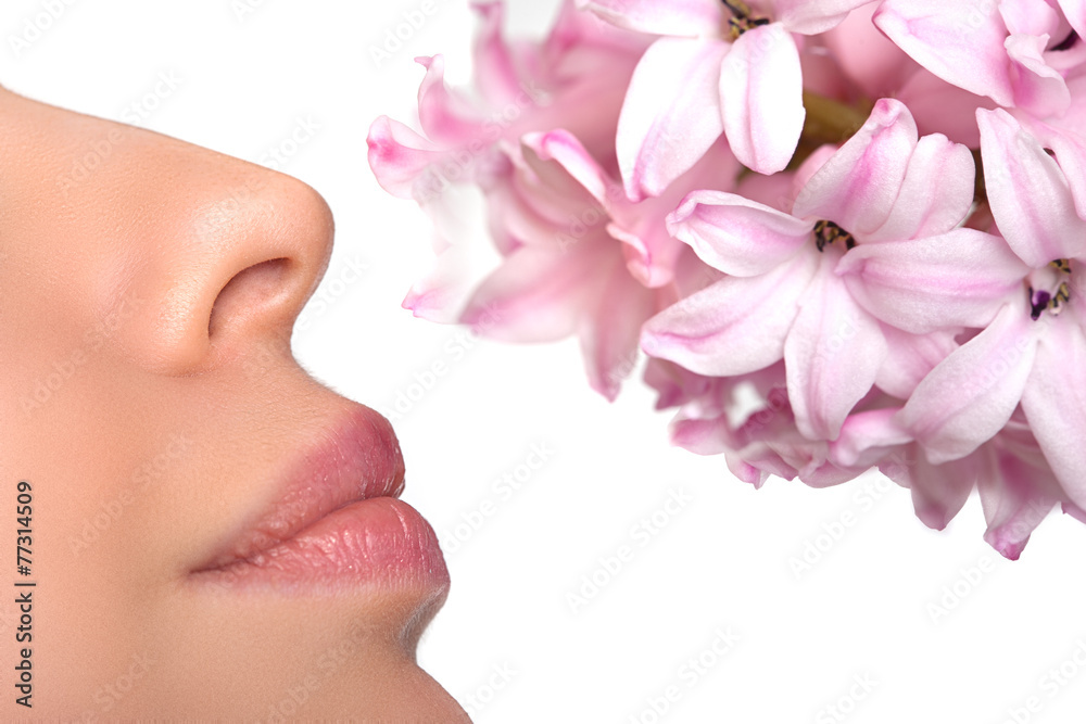 Close-up nose and a flower. Allergy to pollen of flowers. asthma
