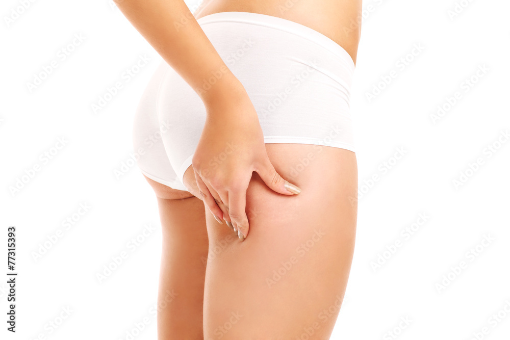 Woman checking skin on her butt