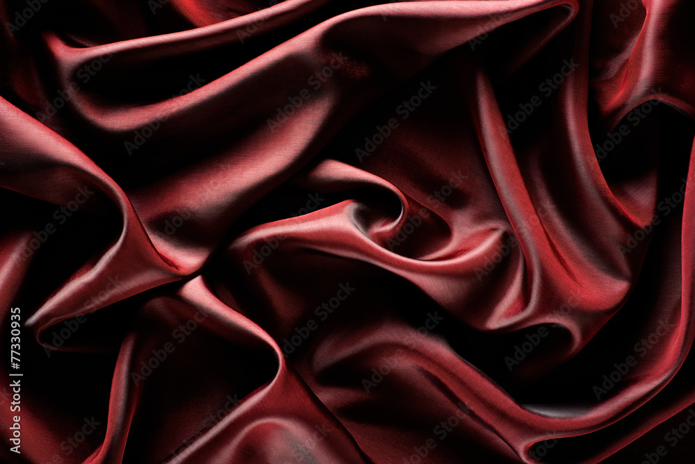Obraz premium Abstract wave textile texture or background in marsala color