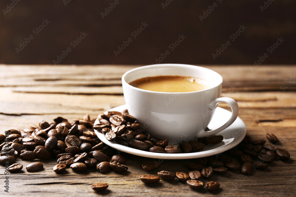 Cup of coffee on wooden table Cup of coffee on wooden table