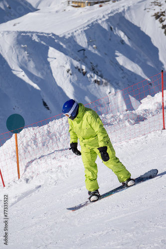 Snowboarder on the mountain slope