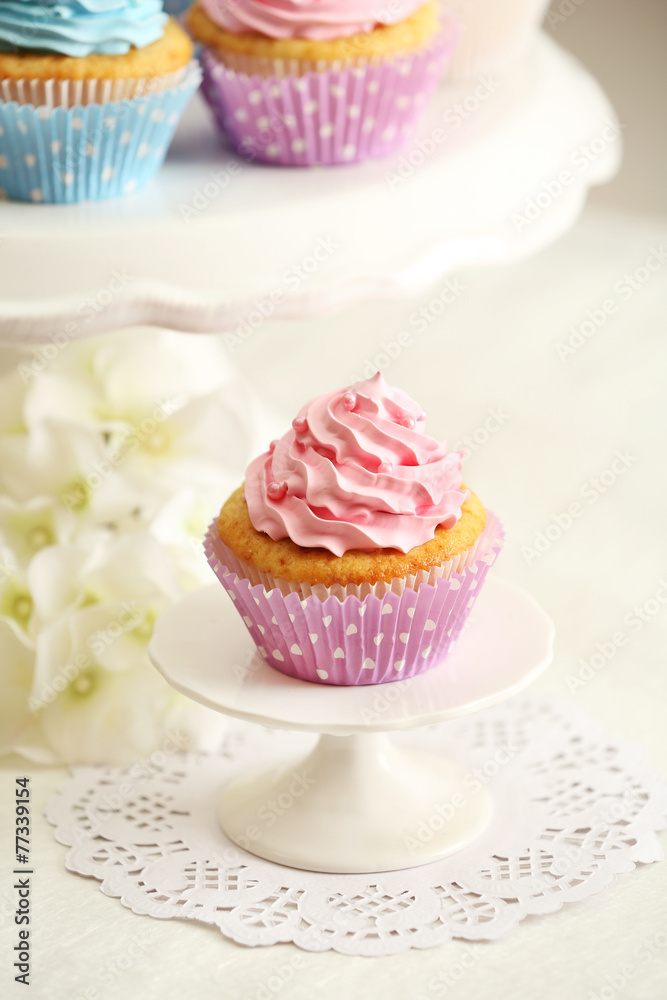Delicious cupcakes on table close-up Delicious cupcakes on table close-up