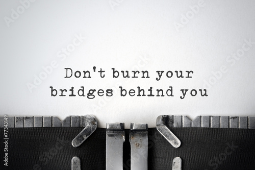 Practicality. Inspirational quote typed on an old typewriter.