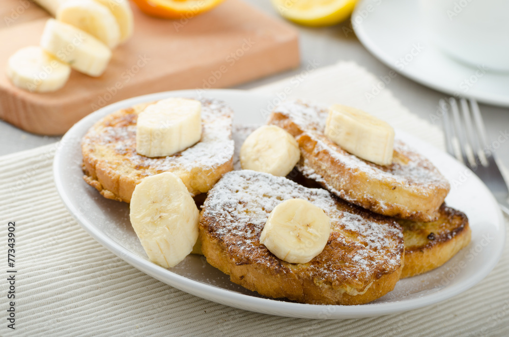 French toast to sweet, with banana sprinkled with sugar