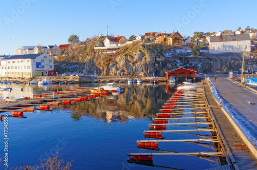 Empty marina docks with red photo