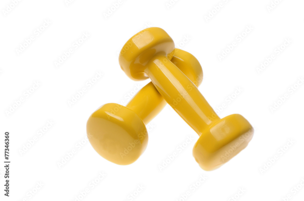 Pair of yellow dumbbells Isolated on white background Pair of yellow dumbbells Isolated on white background