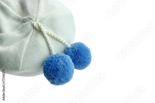 White Knitted Winter Wool Hat With Pom-Pom photo