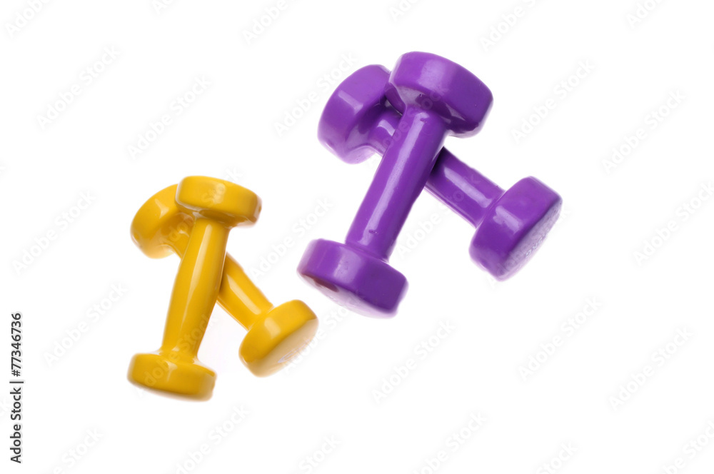 Two Pairs of dumbbells Isolated on white background Two Pairs of dumbbells Isolated on white background