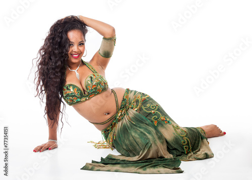 Young belly dancer sitting