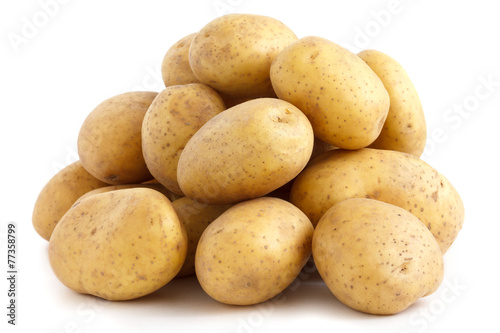 Pile of potatoes arranged on white.