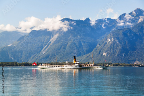 A boat floating in Geneva  lake in Switzerland
