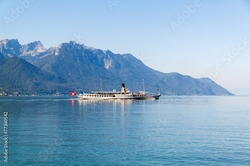 A boat floating in Geneva  lake in Switzerland