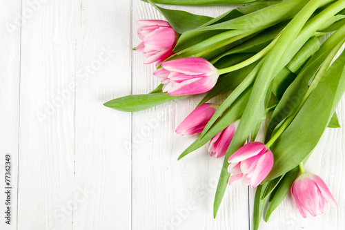 Fototapeta Naklejka Na Ścianę i Meble -  Beautiful tulips on white wood background