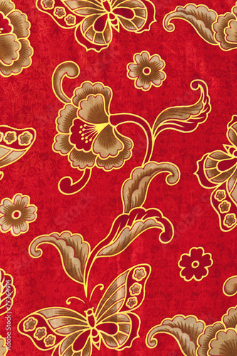 Obraz na płótnie Beautiful gold pattern on red batik