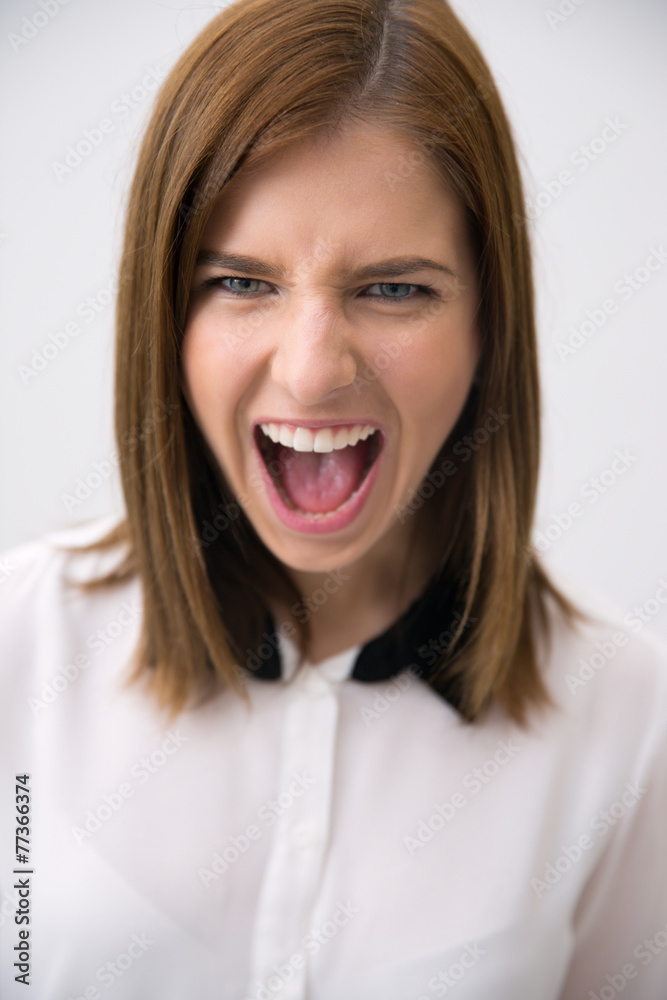 Portrait of attractive woman over gray background Portrait of attractive woman over gray background