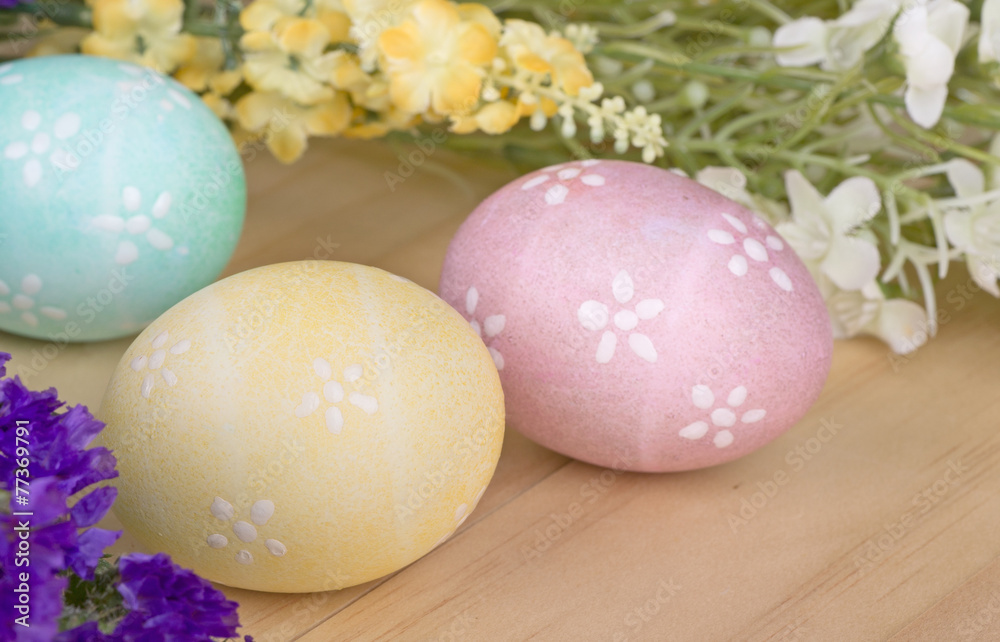 Obraz premium Three Colored Easter Eggs