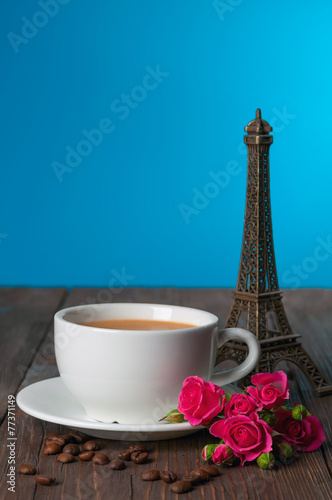 coffee with coffee beans and roses photo