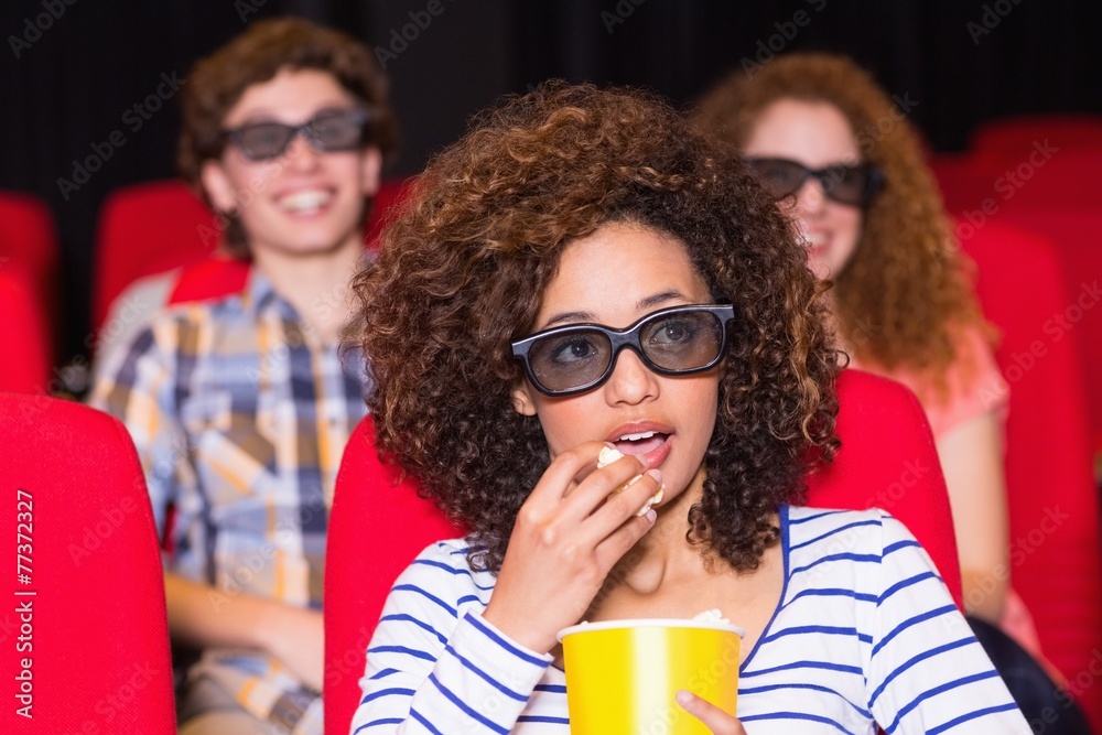 Young friends watching a 3d film