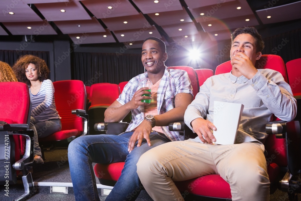 Young friends watching a 3d film Young friends watching a 3d film