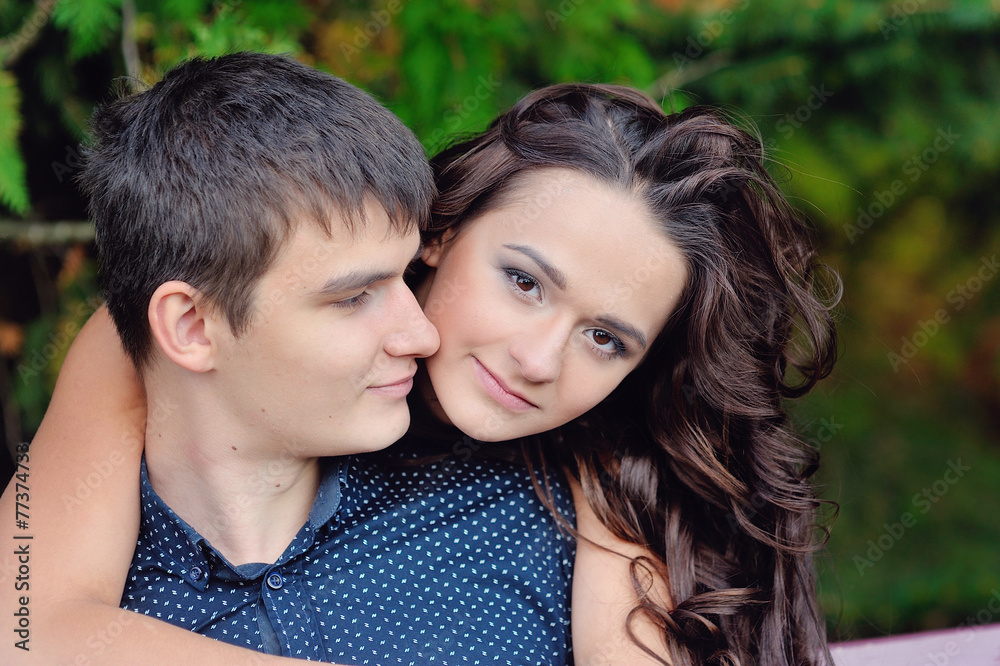 young couple in love woman hugging man, close-up, valentine's da young couple in love woman hugging man, close-up, valentine's da