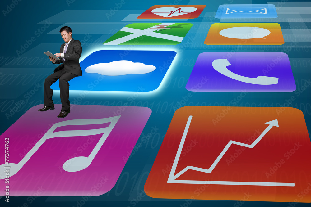 Fototapeta premium Manager using tablet sitting on shiny app icons tech background